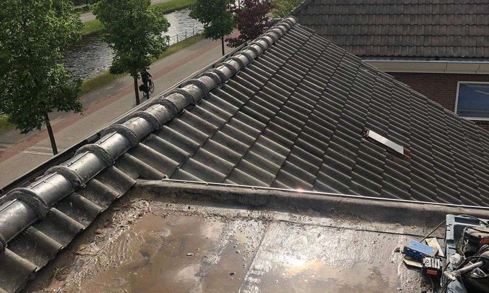 Lekkage op plat dak in Bunde